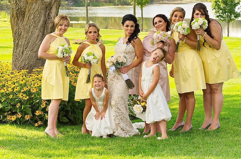 Sassy Bridesmaids in garden at Royal Ambassador wedding