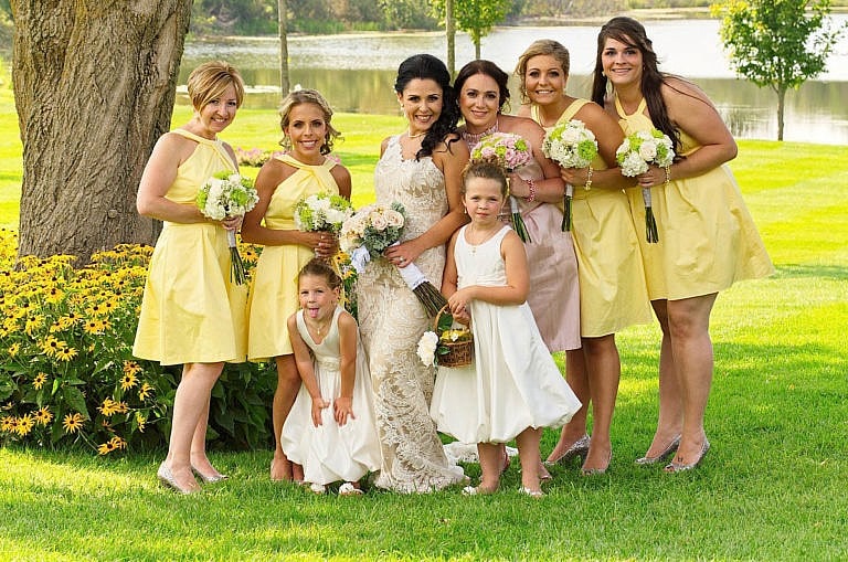 Bridesmaids in garden at Royal Ambassador wedding