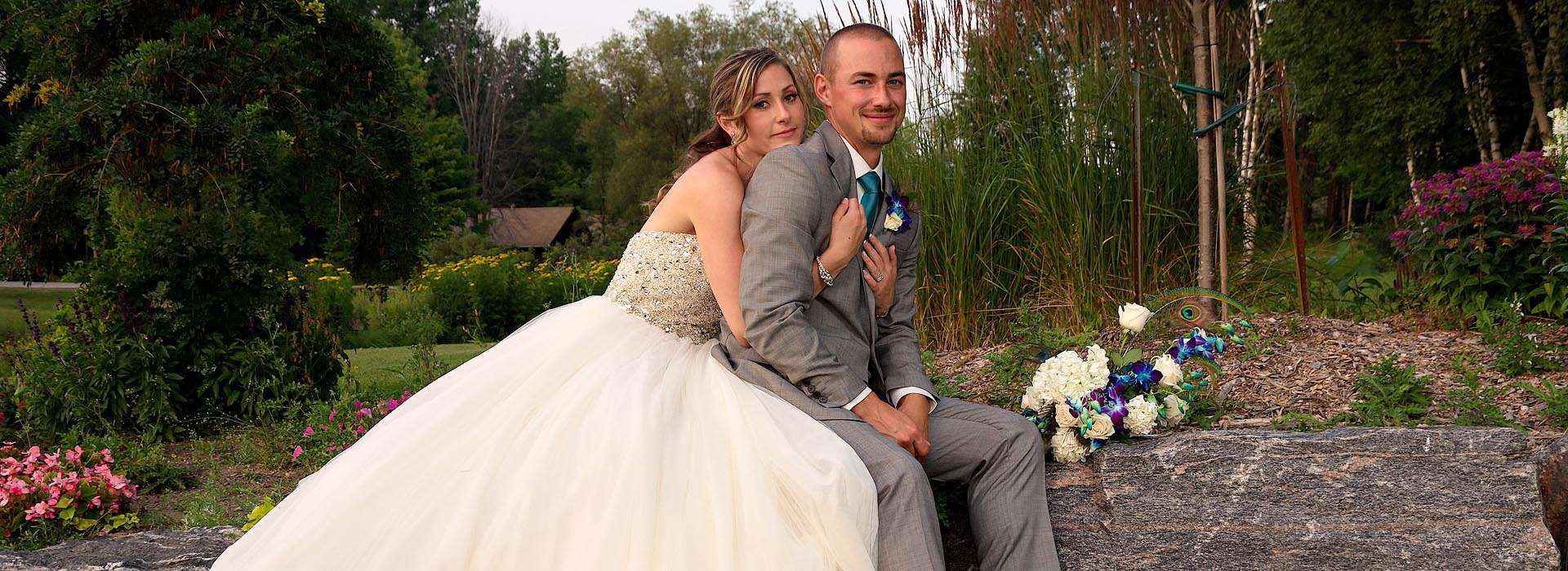 Delta Pinestone Resort wedding couple in garden at dusk