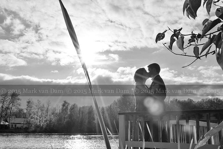 Couple Kissing on Leacock Museum boathouse with sunburst