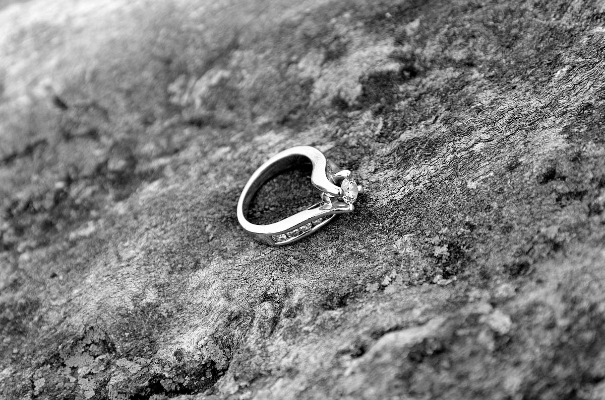 engagement ring on lichen covered boulder at kawartha lakes engagement shoot