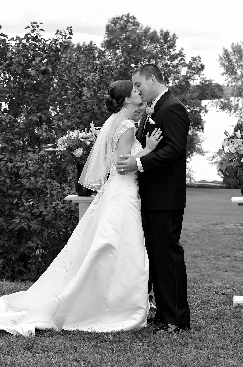 Summer wedding ceremony at The Dunsford House at Eganridge Resort overlooking Sturgeon Lake