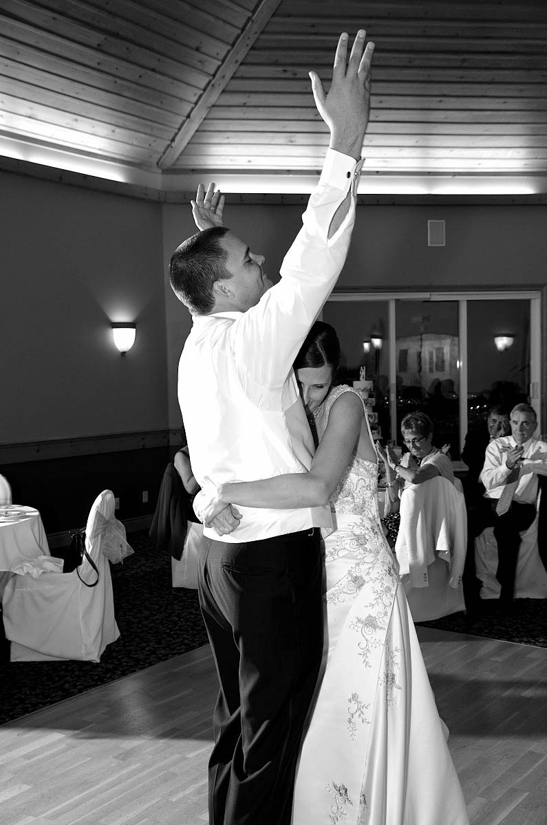 First dance at Eganridge Resort wedding with a triumphant groom
