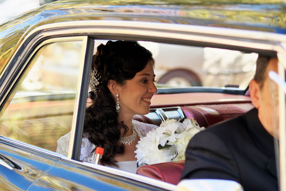 bride arrives by car to vaimede resort wedding ceremony