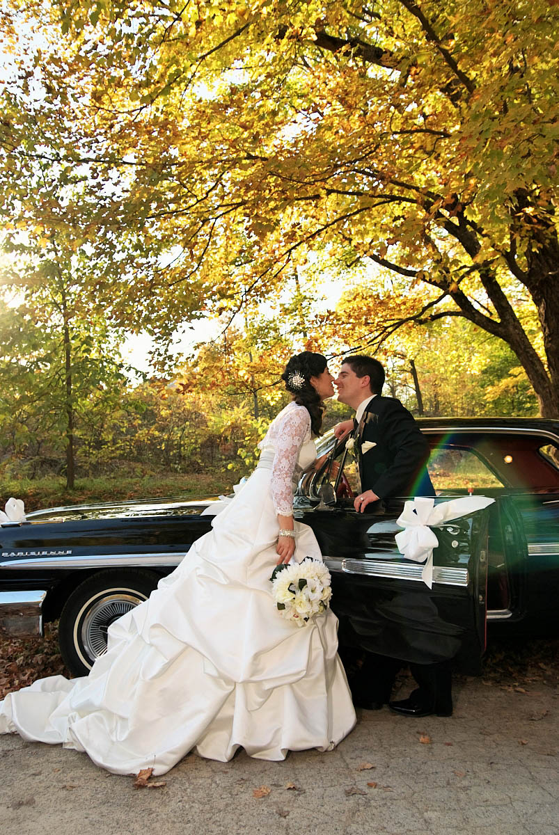bride and groom with vintage car at viamede resort wedding