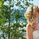 Bride and Groom Kissing with Georgian Bay behind