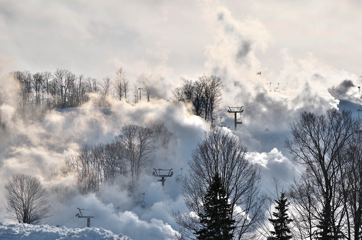 Ski Lifts at Horseshoe Valley Resort Partially Obscured by snow making.