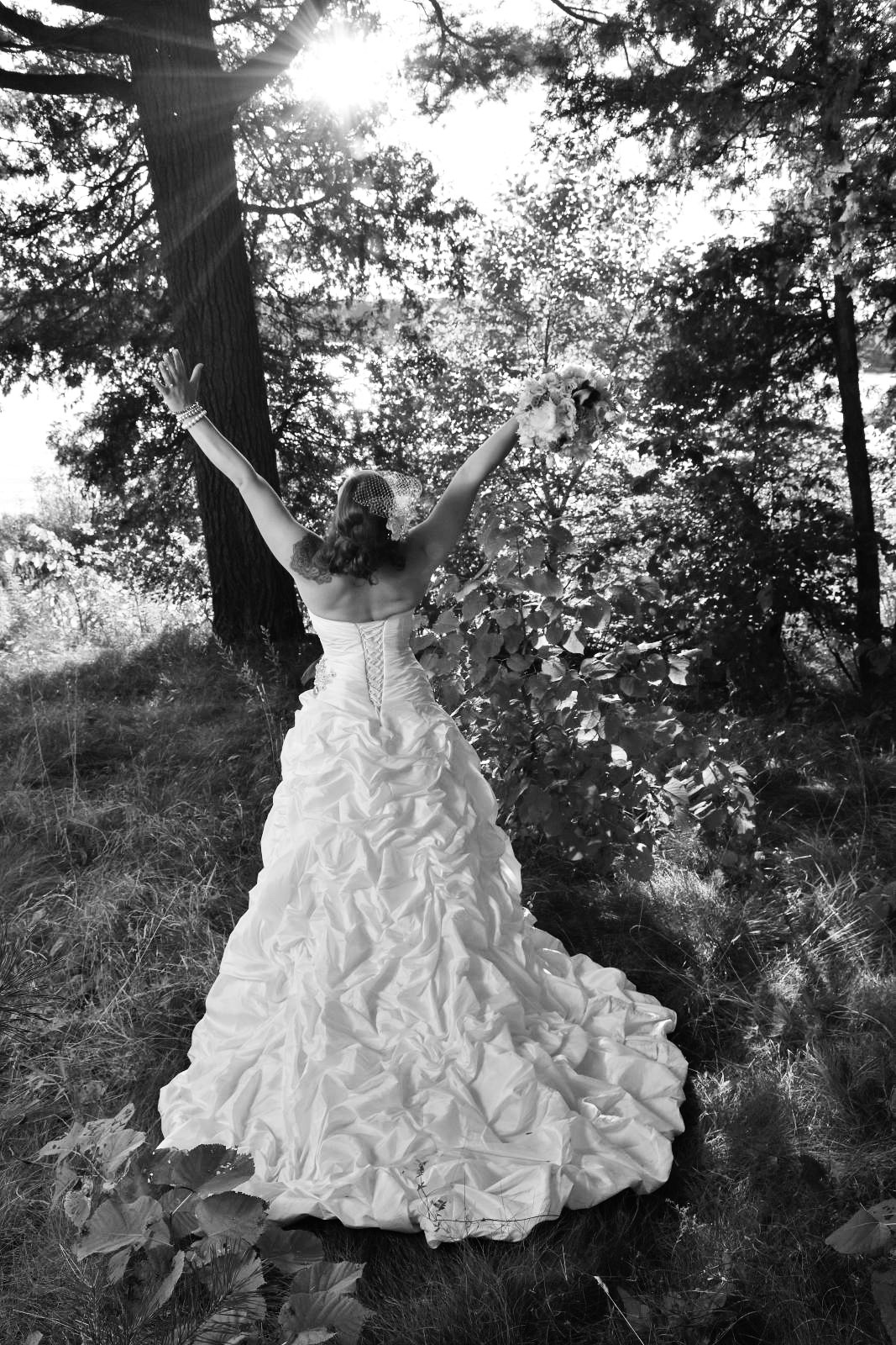 bride lifts hands to sky in penetanguishene, ontario