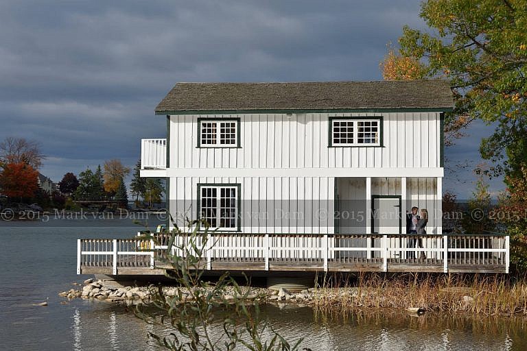 Couple Kissing on Leacock Museum boathouse with sunburst