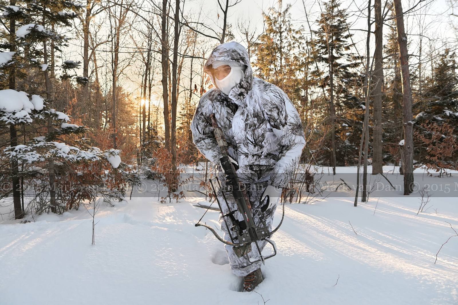 Winter Crossbow Photography, still hunting in deep snow with snow camo