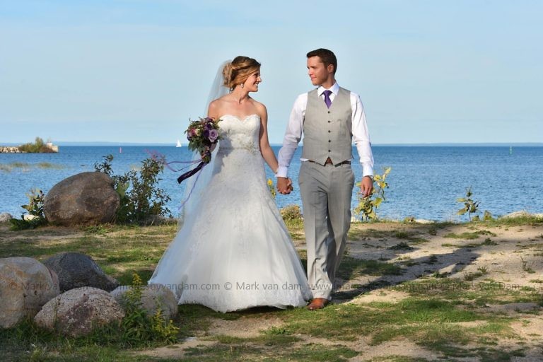 Bear Estate Wedding: Bride and Groom walk hand in hand at Bear Estate