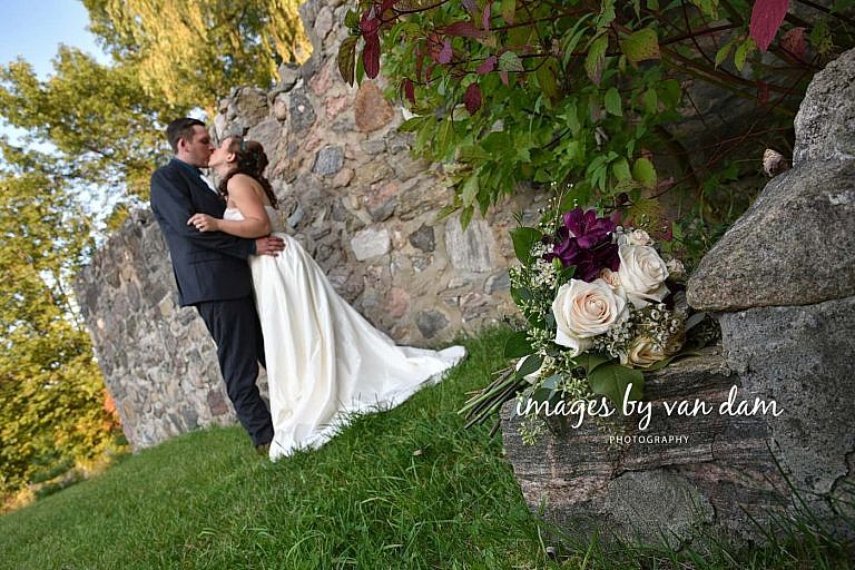 bouquet on ruins at Sainte Marie Park wedding