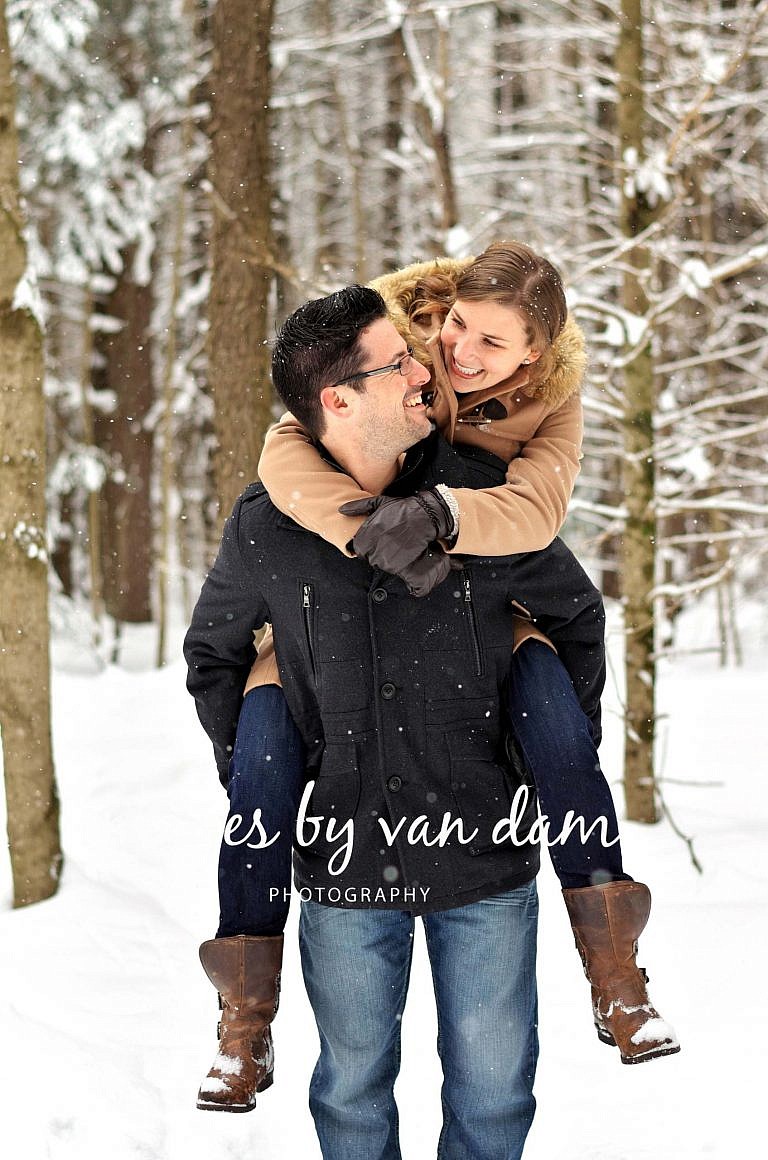 Young man piggybacks woman
