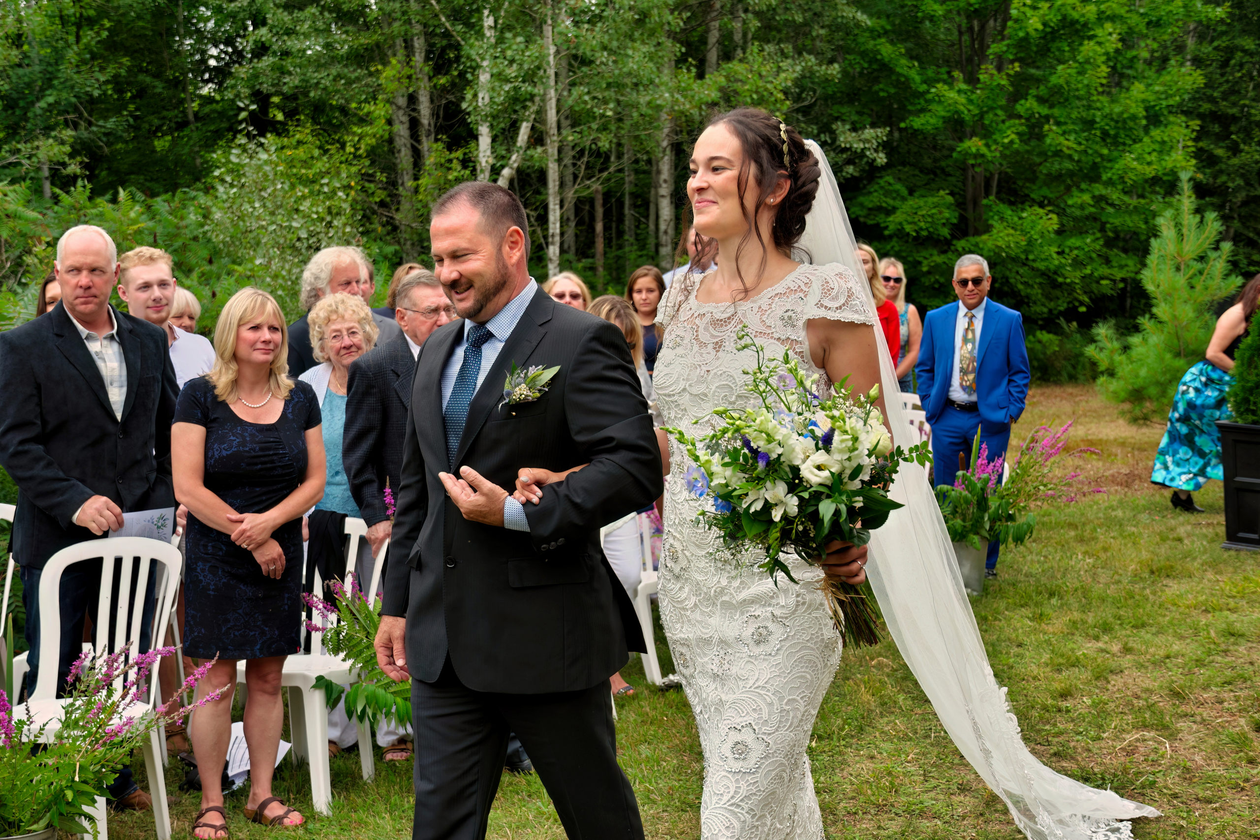 Bride Walking down Aisle with Her Father at northern Ontario wedding